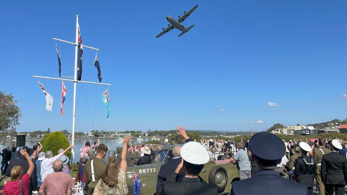 RAAF Hercules flying low and slow over Merimbula Memorial. Picture by James Parker