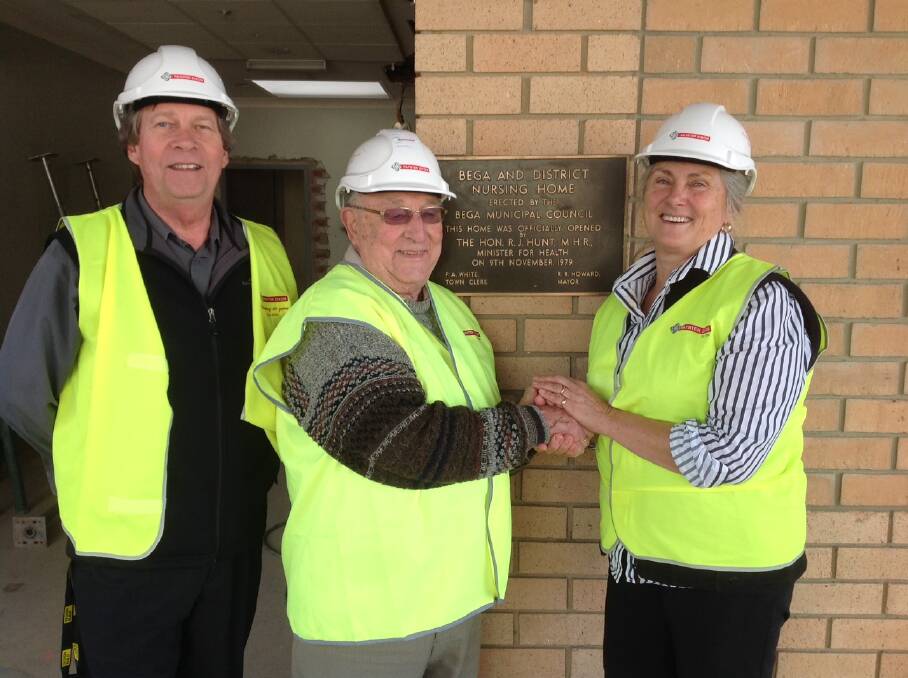 CONGRATULATIONS: Dirk Kruit is thanked by Jim Butterworth  and Kathy Miller alongside Hillgrove House's original dedication plaque dated 1979 at the main door.