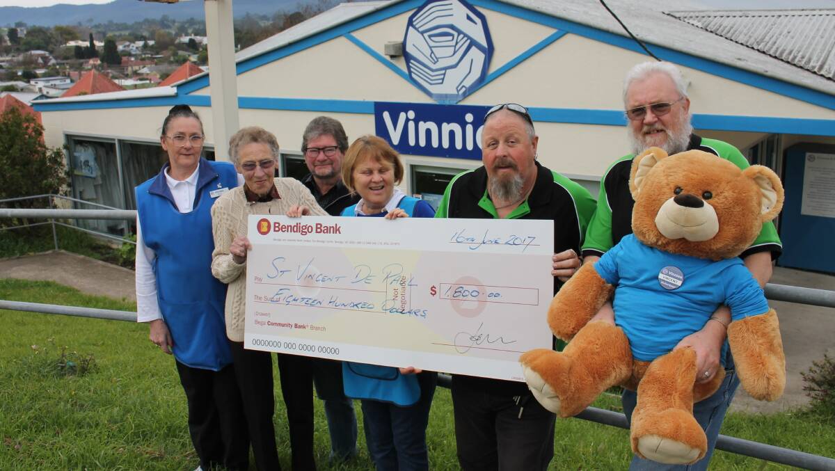 WARM WELCOME: Proceeds from the annual Winter Appeal and Blanket Ride are handed to representatives of Bega's St Vincent de Paul welfare conference.