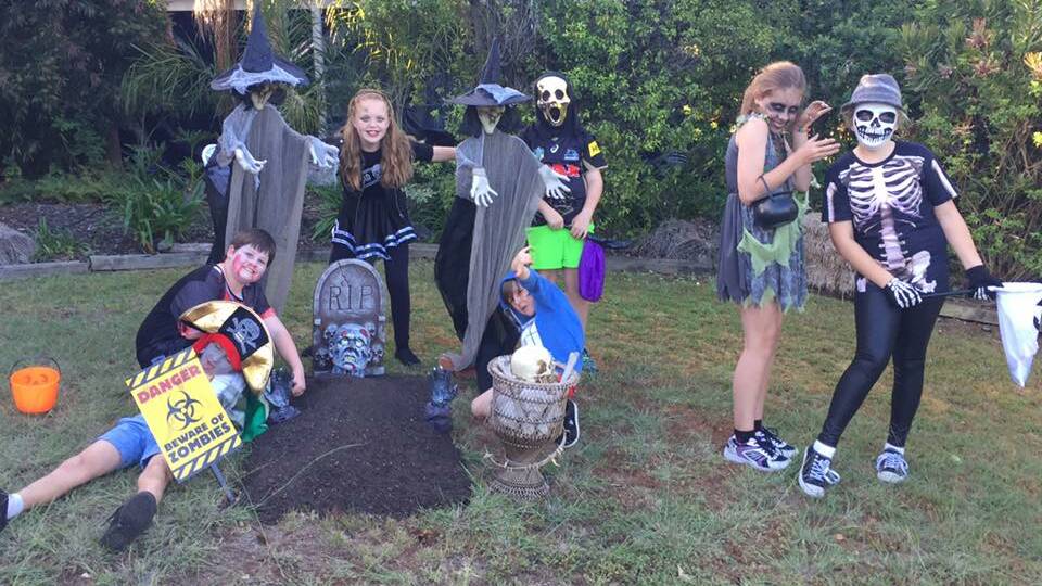 Halloween trick-or-treaters get into the spooky mood at Tura. Photo submitted by Michaela Pascolutti.