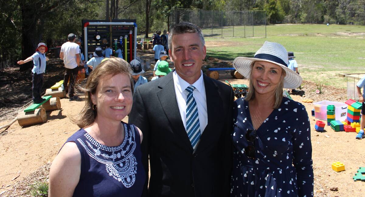 Pambula P&C committee president Anna Quinlan and teachers Richard Lane and Emma Whitbread admire the newly opened outdoor learning space.