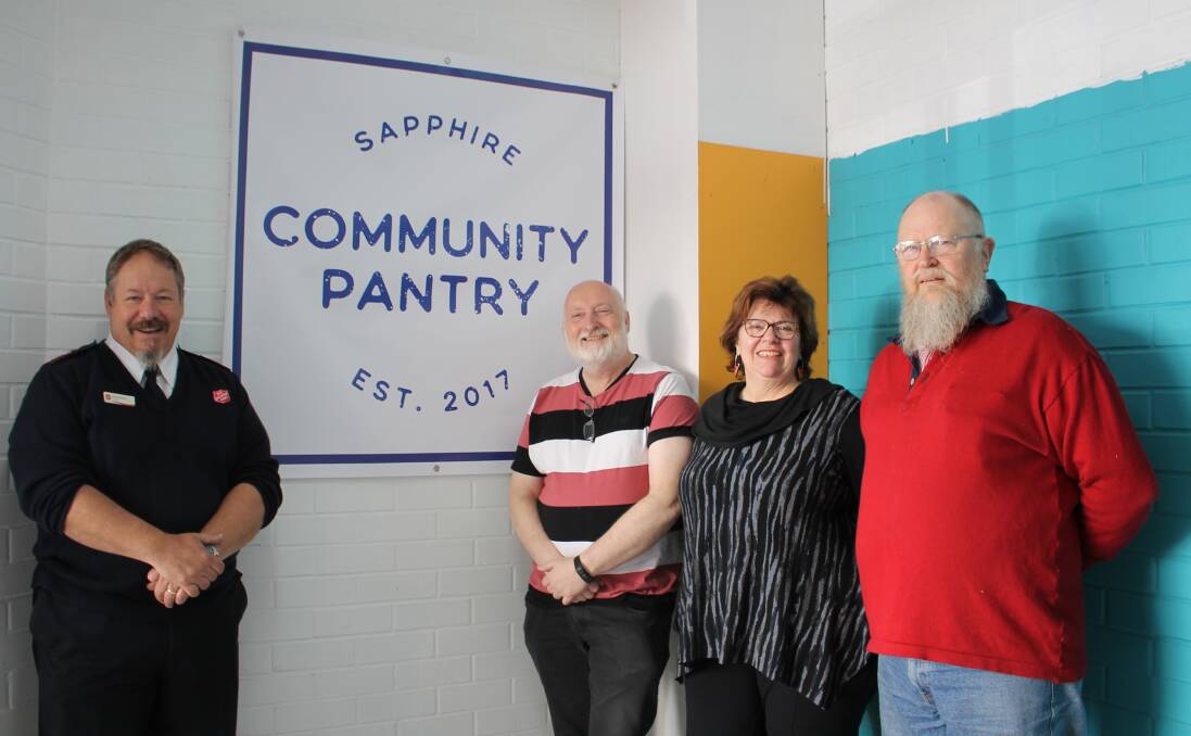 Nearly there: Rod Parsons of Bega's Salvation Army meets at the new shop site with Community Pantry committee members Peter Buggy and Christine Welsh and Family Store manager John Horsburgh. Photo: Alana Beitz