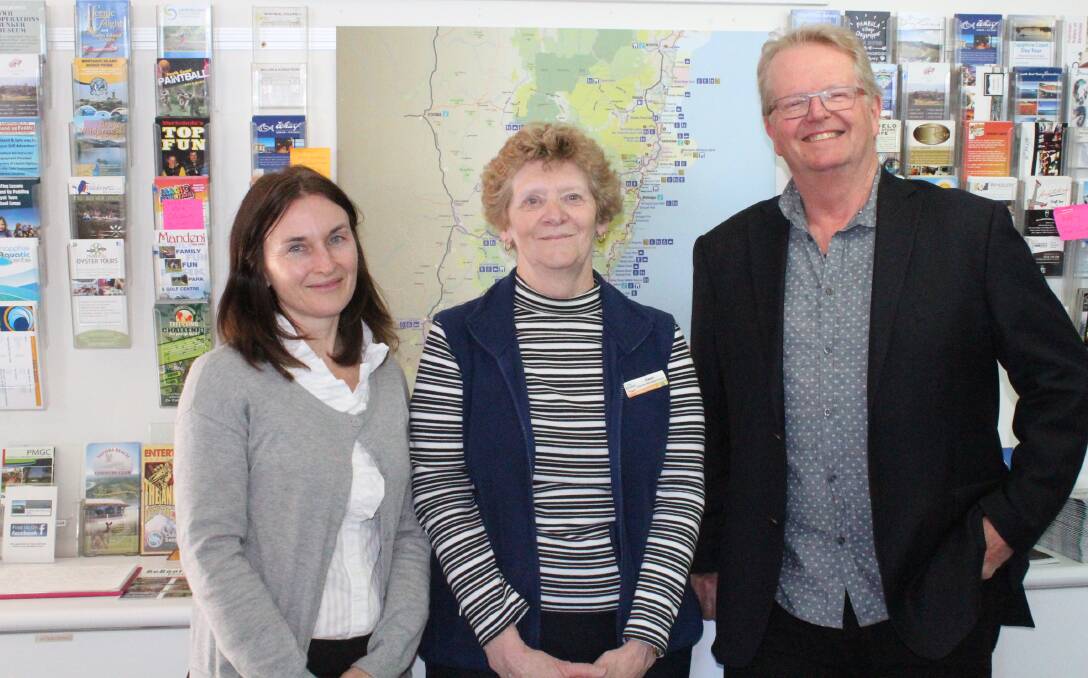 Tourism co-ordinator, Ginny Francis, volunteer Gwen Langthorne and tourism manager at the Merimbula Visitor Information Centre Chris Nicholls. 