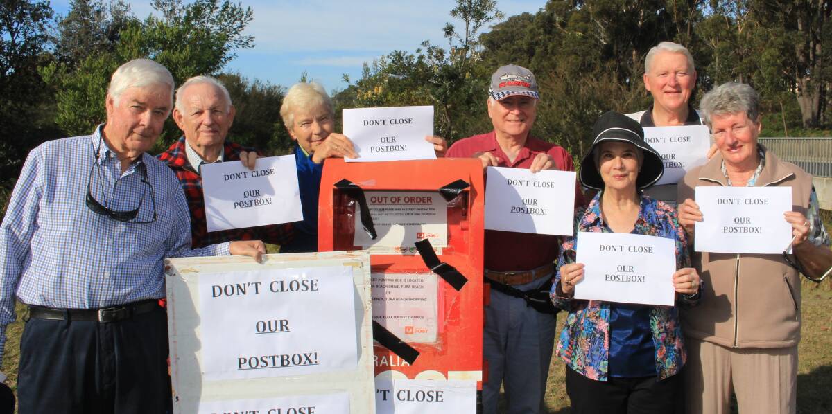 Protest: Jon Gaul, Wolfgang and Regene Kasper, Roslyn and John Sexton and Geoff and Sue Dove protest over the closure of the post box.
