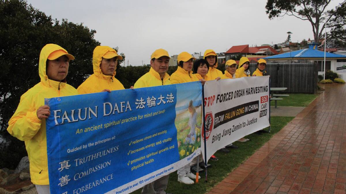 Falun Gong supporters take to the road