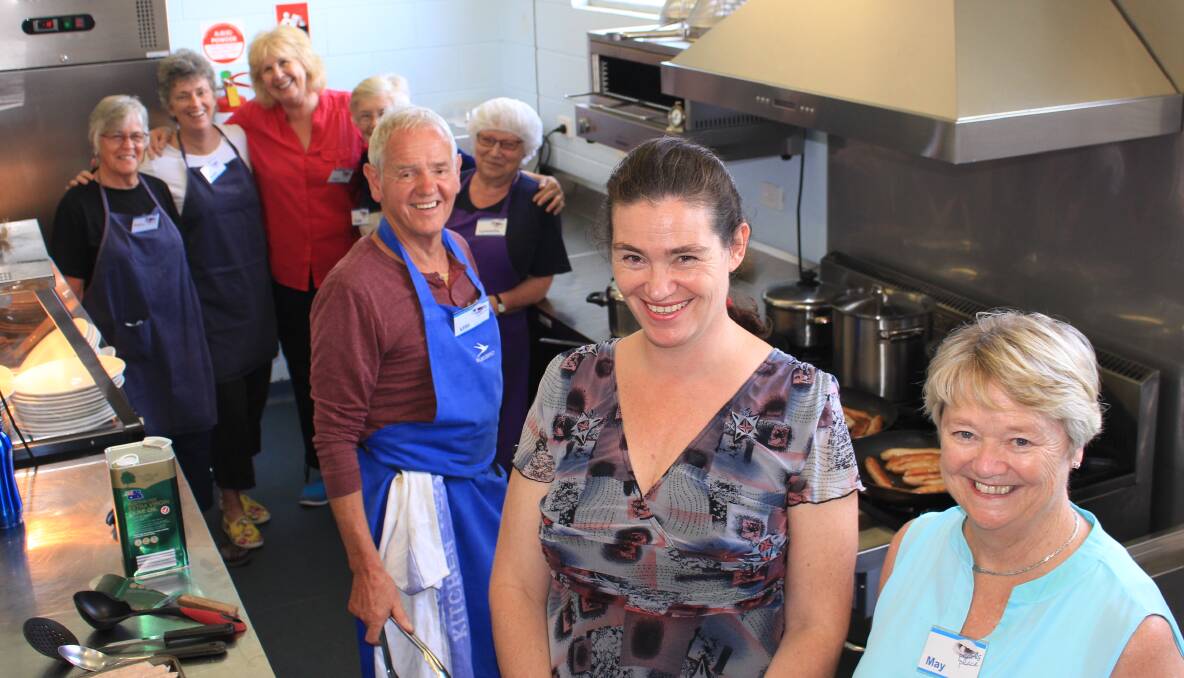 Jenny High and Pearls Place president May Kerr in the kitchen at Pearls Place with volunteers prior to the weekly lunch at the Pambula Masonic Centre.