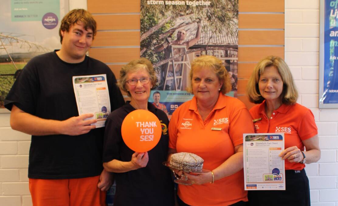 ORANGE FOR A GOOD CAUSE: James Knox and June Walley, of the Eden SES are seen here with NRMA staff members, Margaret Bailey and Clare Miller.