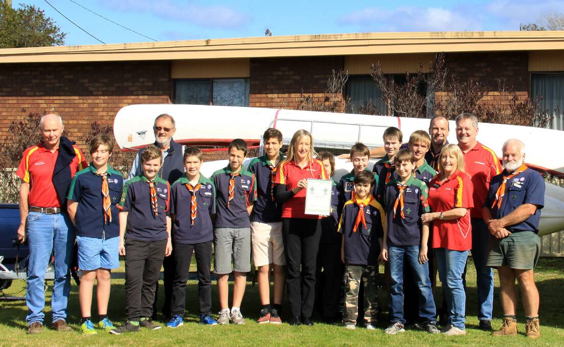 GOT IT COVERED: 1st Merimbula Scouts have thanked Bendigo Bank, Pambula for the donation of a marquee and help with the purchase of new tents.