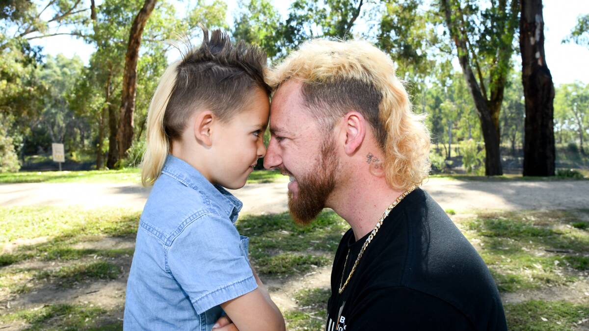 Five-year-old Lucas Chan and dad Rhys Chan are rocking matching mullets for mental health. Picture by Bernard Humphreys