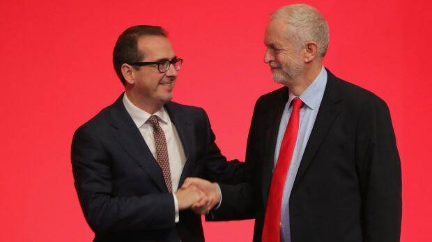 Jeremy Corbyn MP (right) shakes hands with Owen Smith MP as they arrive to hear the result for the new leader of the Labour Party. Photo: Getty Images