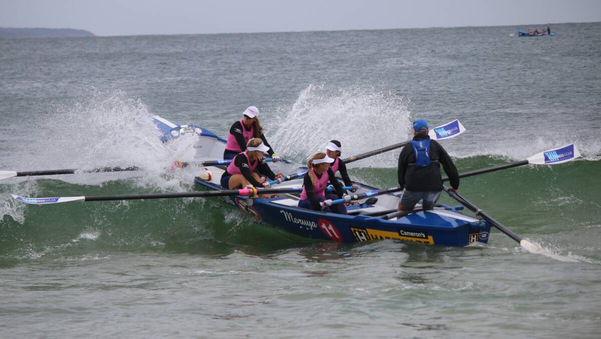 One of the women's teams carves through the waves during the Bermagui leg of the George Bass Marathon in 2016. 
