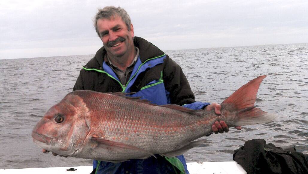 Catch and release: Competition organiser David Dulhunty with an over one-metre snapper he caught recently. 