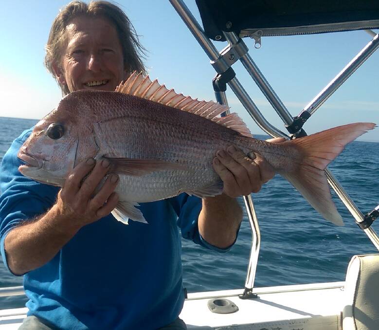Simply red: Local angler Terry Mulcahy shows his lovely snapper taken off Haycock Point.  Inshore reefs continue to fish well for Snapper and Morwong. 