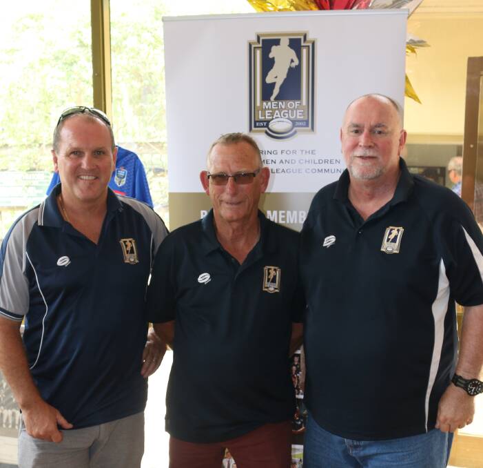 Great show: Men of League state manager Stuart Raper, FSC branch president Col Clarke and guest auctioneer Neville Glover get ready for presentations on Sunday. 