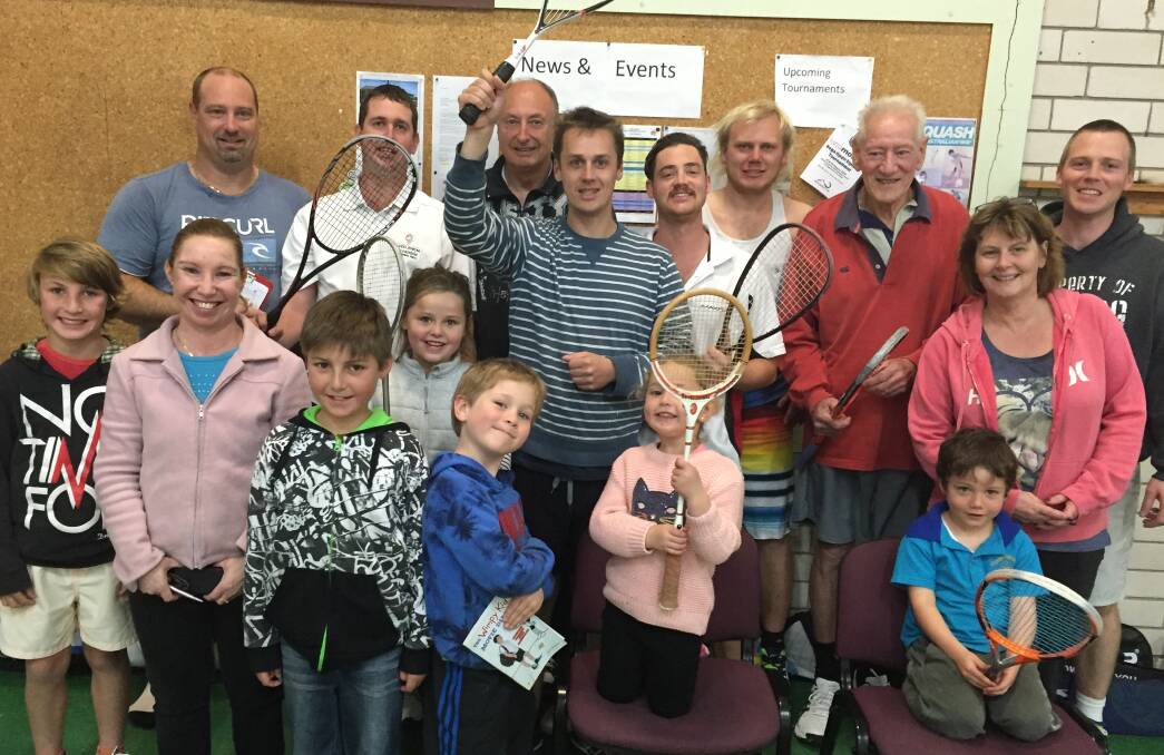 Players gather for the final round of normal play before the finals at the Merimbula Squash Club. 
