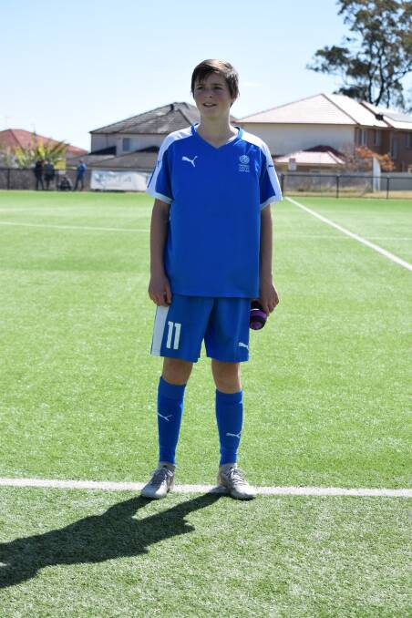 Football titles: Merimbula's Bailey Howker kitted out in the blues he will wear for the NSW country team in national championships on Monday. 