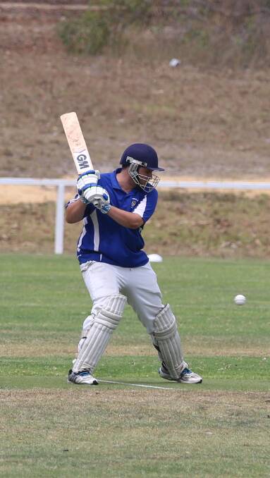Eye on the ball: A Pambula batsman dips low to meet a shot against the Tathra Sea Eagles on Saturday, but the Sea Eagles stole the show. 