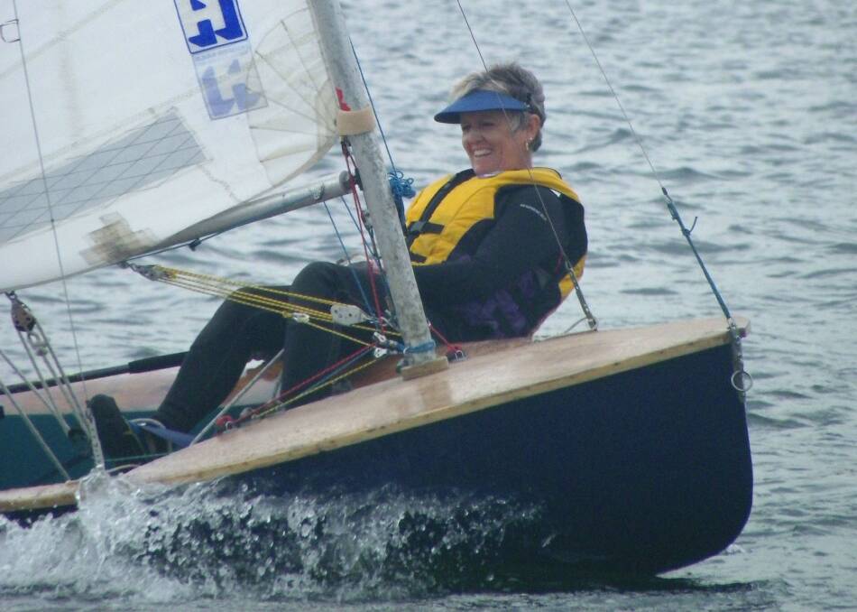 Out in front: Wendy Miller was delighted to win one of the Wallagoot Lake Boat Club's races on Saturday in ideal sailing conditions. 