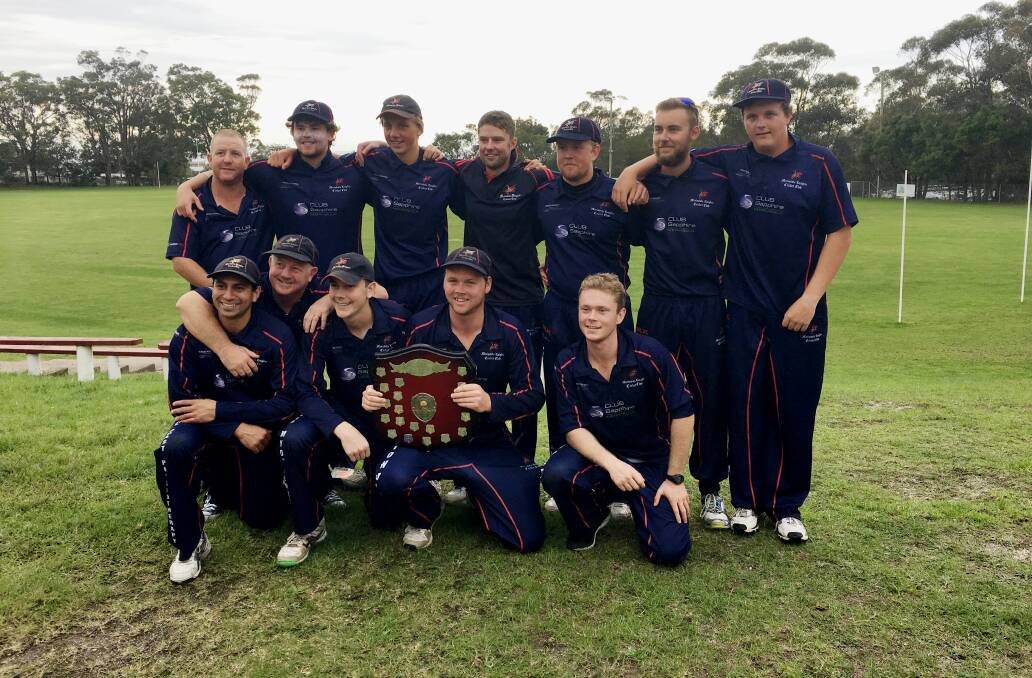 We are champions: The Merimbula Knights hold up the FSC Cricket Association A grade premiership after downing the Sea Eagles on Saturday. 