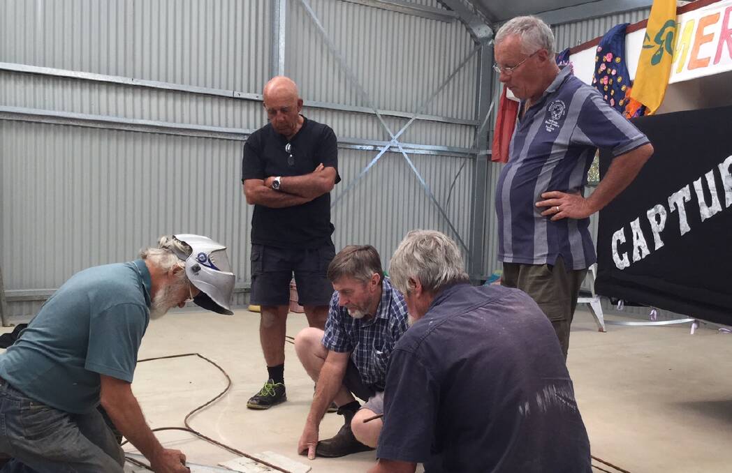 Dragons prep whale: Charles Helmore, Terry Casey, Dave Hutchison, Laurie Smith and Mick Wood begin the tail's construction.