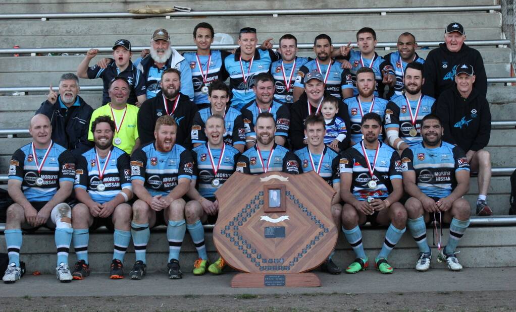 DEFENDING PREMIERS: The Moruya Sharks first grade premiership winning team and support staff following the win last year.