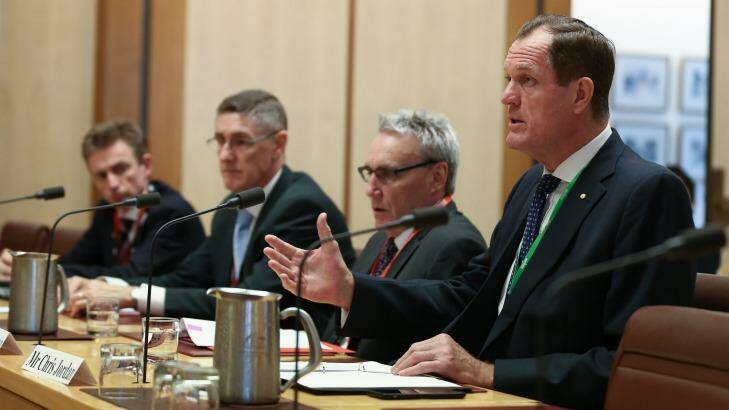 From left: The ATO's Jeremy Hirschhorn, Mark Konza, Michael Cranston and Chris Jordan appear before one of their scrutineers, the Economics References Committee at Parliament House in Canberra.  Photo: Alex Ellinghausen
