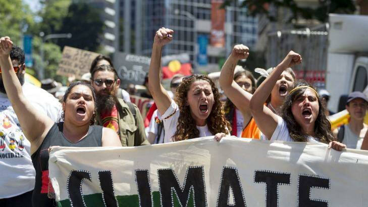 Demonstrators protest in Brisbane over climate change   ahead of the G20. Photo: Glen Hunt