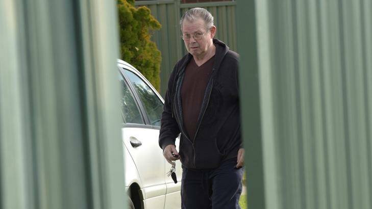 George Williams arrives at his Broadmeadows home in Melbourne, Tuesday, July 7, 2015. Williams' home was the scene of a drive by shooting ten minutes before a policeman was shoot in the head in Moonee Ponds overnight. (AAP Image/Julian Smith) NO ARCHIVING George Williams arrives at his Broadmeadows home in Melbourne, Tuesday, July 7, 2015. Williams' home was the scene of a drive by shooting ten minutes before a policeman was shoot in the head in Moonee Ponds overnight. (AAP Image/Julian Smith) NO ARCHIVING Photo: JULIAN SMITH