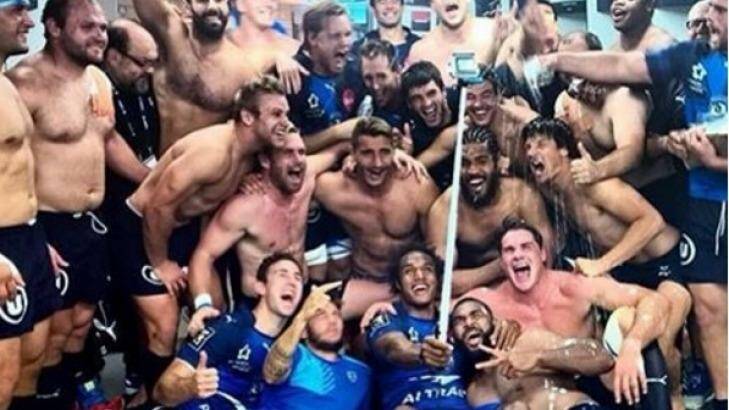 Montpellier's Canberra contingent celebrate with teammates after a win in France