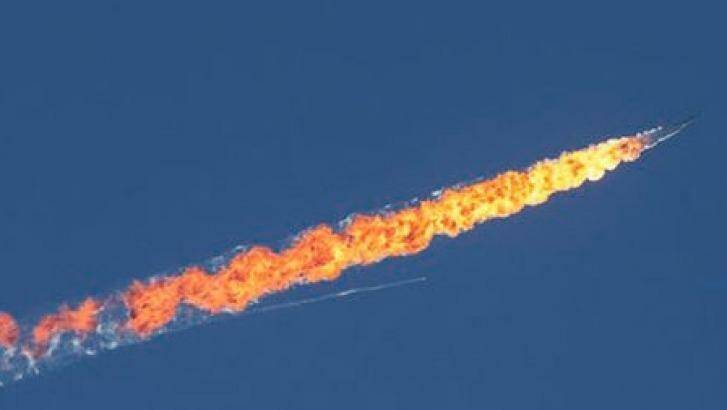 Flash point ... Footage reported to be that of the Russian fighter jet after it was shot by the Turkish Air Force over the Turkey-Syria border. Photo: Twitter/Habertürk TV