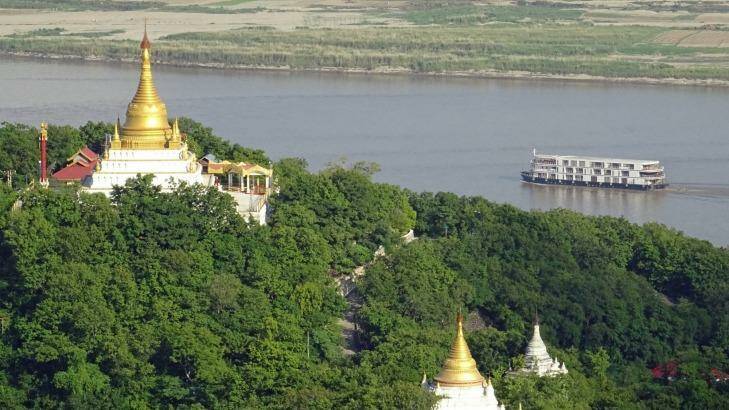 Sanctuary Ananda sails on the Irrawaddy River past Sagaing.