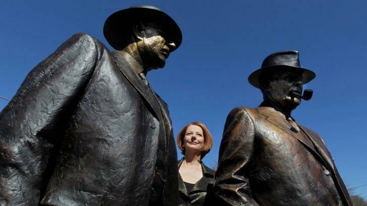 Former PM Julia Gillard with the statue. Photo: Andrew Meares