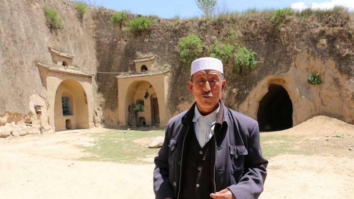 Hai Zhengjun, 64, in front of his former cave dwelling. The land where Hai and his family live has an average annual rainfall of 300-500 millimetres.  Photo: Sanghee Liu