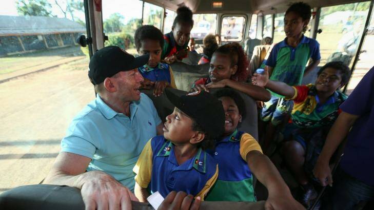 Prime Minister Tony Abbott joins the Remote School Attendance Strategy bus. Photo: Alex Ellinghausen
