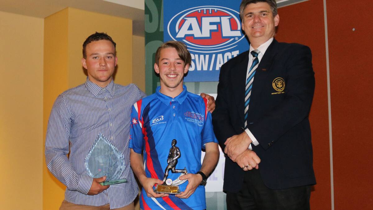 SCAFL best and fairest Panther Aaron Proctor with runner-up Digger Aaron Daley and major sponsor from Merimbula RSL Michael Mutsch. 