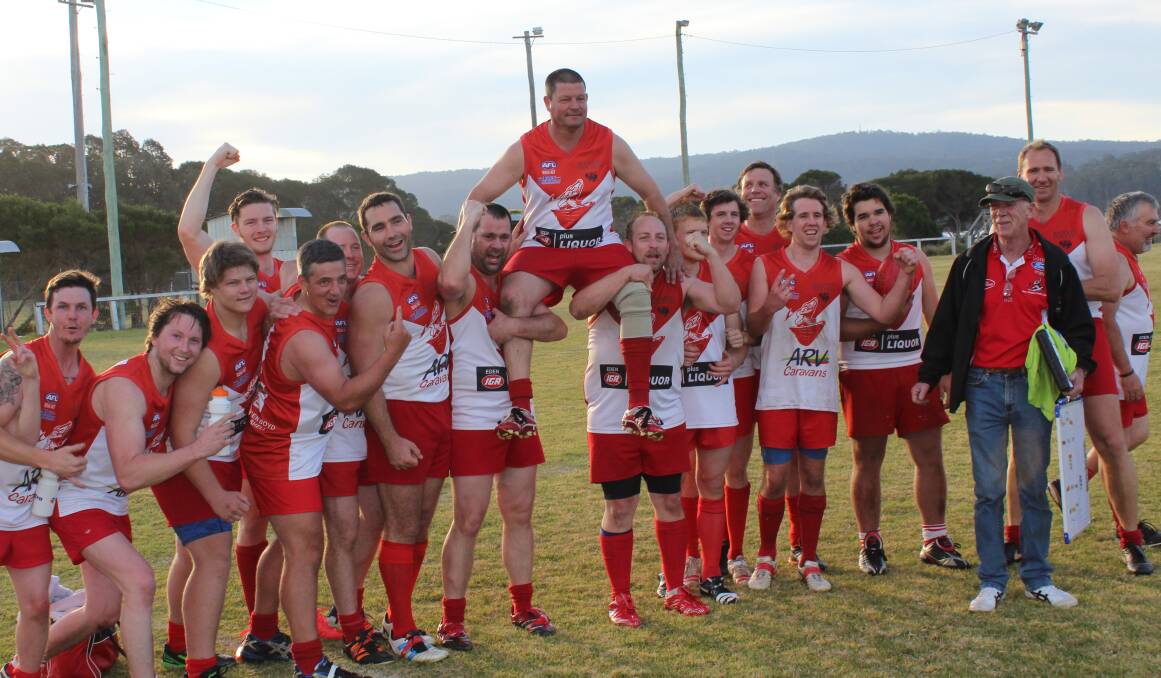 • Paul ‘Plugger’ Kirkby is carried from the field to celebrate his 400th SCAFL game for the Eden Whalers where the team provided a solid win over the Narooma Lions on Saturday, which was his birthday to top off the occasion. 