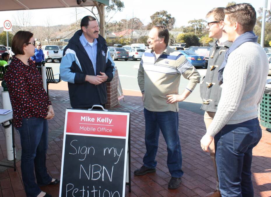 NBN PETITION: Dr Mike Kelly, Labor candidate for Eden-Monaro, out getting signatures for the NBN petition. 