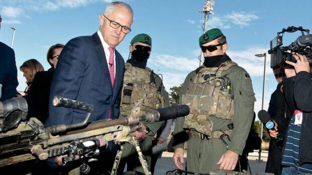 Prime Minister Malcolm Turnbull, pictured with Australian Defence Force personnel, will meet with state and territory premiers on Thursday to discuss new counter-terrorism offences. Photo: Ben Rushton
