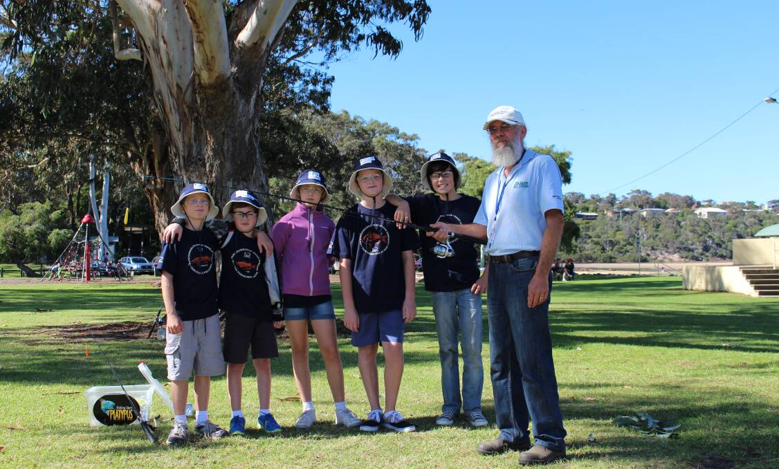 Patrick Greenway, left, Aiden Old, Sharae Greenway, all of Canberra with Will Robinson, Eden, Noah Cotes, Bombala and Fisheries volunteer, Malcolm Campbell.