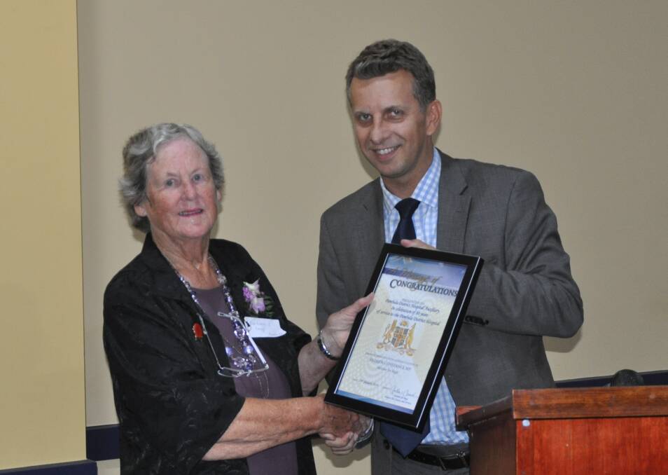 Member for Bega, Andrew Constance presented president of the auxiliary, Barbara J Davy with a certificate of congratulation for the auxiliary’s 80 years of operation. 
