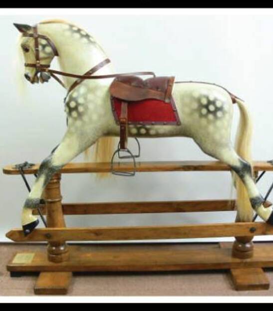 A picture of how Wendy Lucas ' swing rocking horse might look if it was renovated.