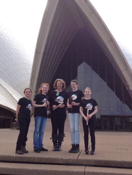 The girls are very excited for their performance at the Sydney Opera House tonight. Jessica Bird, left, Anais Gould, Mrs Liz Thomas, Ffion Roberts-Thompson and Ashley Sher. 