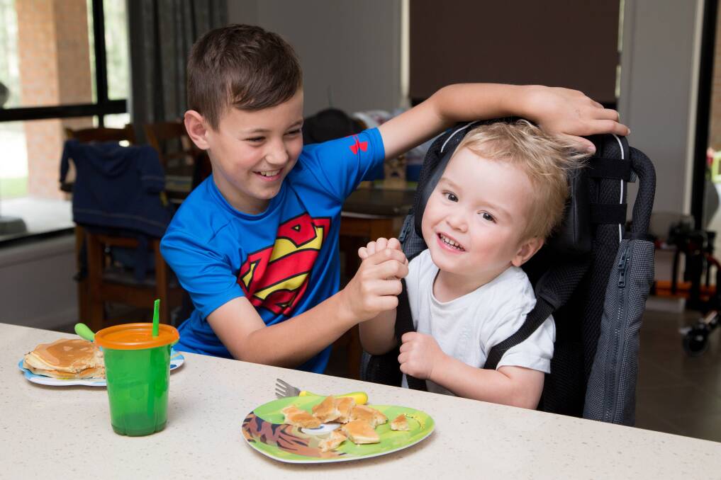 Spencer Clarke from Greenhills, who has Spastic Diplegic Cerebral Palsy and cannot walk, stand and sit without assistance. Thanks to Variety - The Children’s Charity NSW’s provision of a Lo base, Spencer can now sit comfortably at the dinner table and breakfast bar with his big brother, Connor
