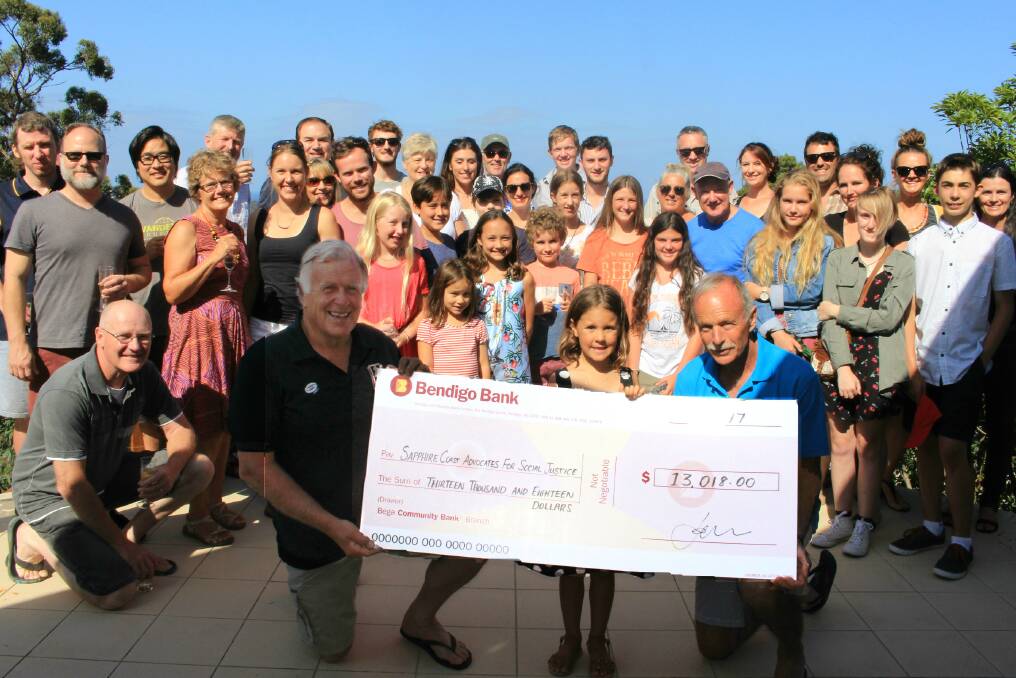 Giving back: Sapphire Coast Advocates Mick Brosnan and John Liston – who was also a main character in the musical – accepted the cheque and expressed their sincere thanks to all involved. Picture: Melanie Leach