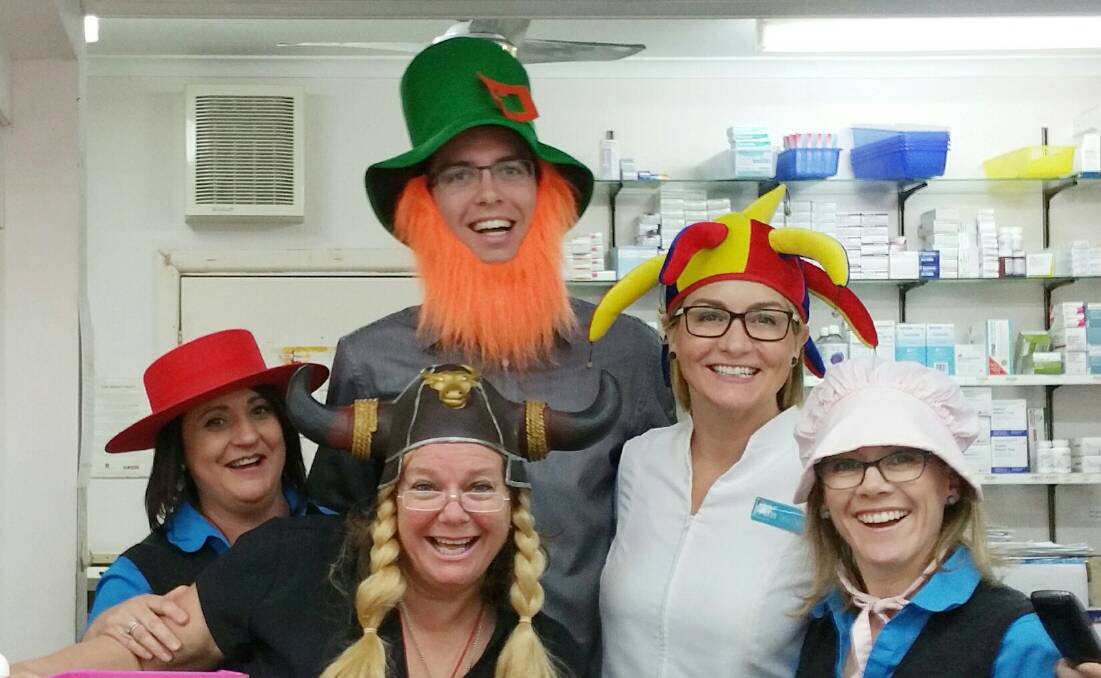 Mad Hatters: Staff at Seeto Dodd and Dwyer enthusiastically participate in the Merimbula Chamber of Commerce's crazy hat day on Friday, August 19. 