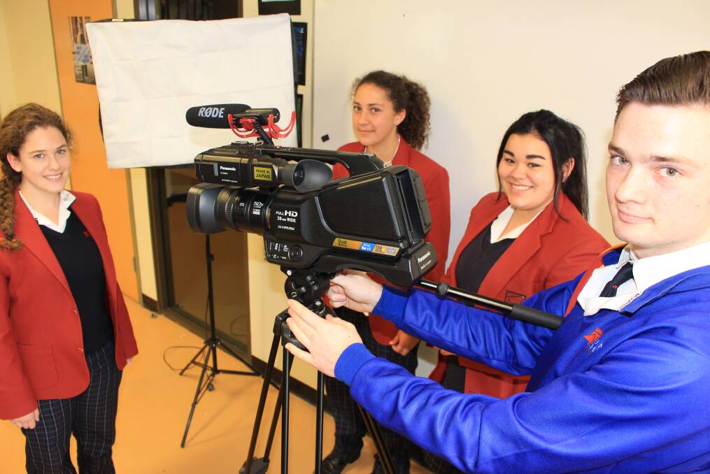 Lights, Camera, Action: Lumen Christi's South East Arts YoofTube finalists Jessica Palacios, Ruby Bichard, Carlie Stolzenhein and Rian Reynolds with one of the school's cameras. Picture: Melanie Leach