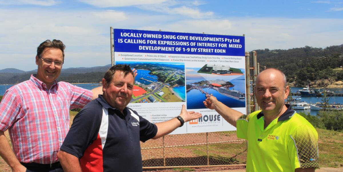 Prime development: Adam Donaldson from Inhouse and two of the Snug Cove Developments co-owners Neil Rankin and Mark Baker with the Expressions of Interest sign they installed at their site in Eden. Picture: Melanie Leach