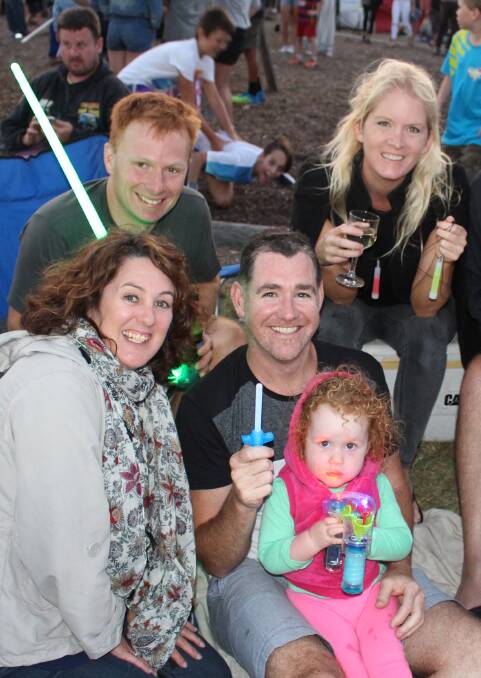 Happy New Year: Thousands of families gathered for a big night of celebrations at the New Year's Eve spectacular at Ford Park, Merimbula, last year. 