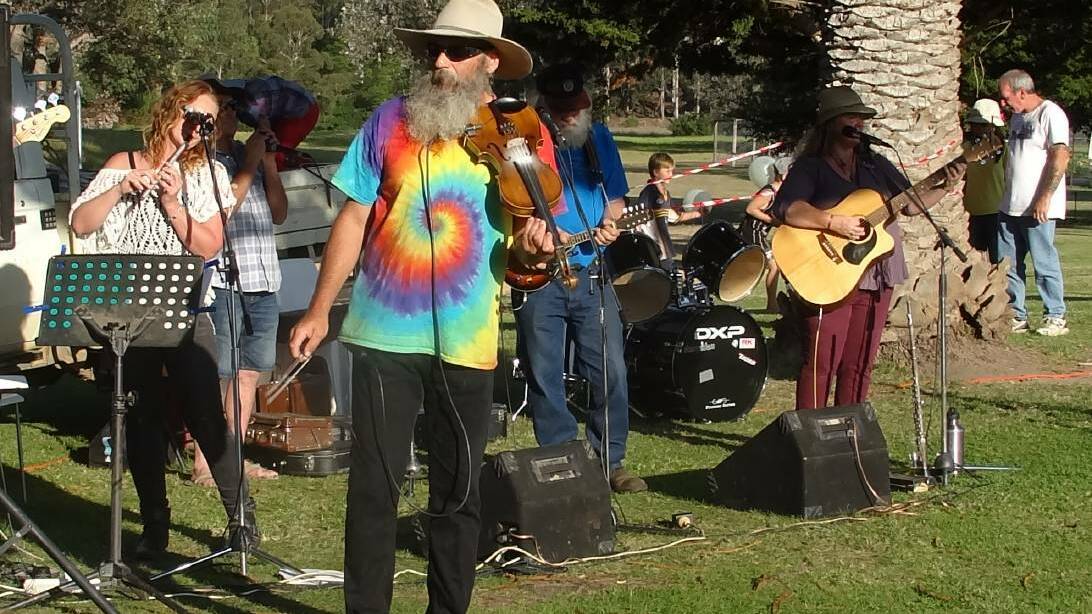 SINGALONG: Gus Olding of the band Frock'n'Troll takes centre stage at the Wanderer Replica Project fundraiser on the lawns of the Seahorse Inn, Boydtown for last year's Easter fundraiser.