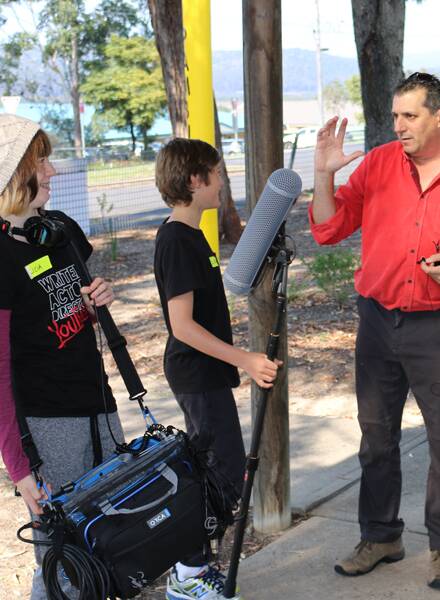 Film school tutor Brent Occleshaw talks microphones in the Sound workshop with eager students Alicia Munt from Pambula and Lochlann O'Duibhir from Merimbula.